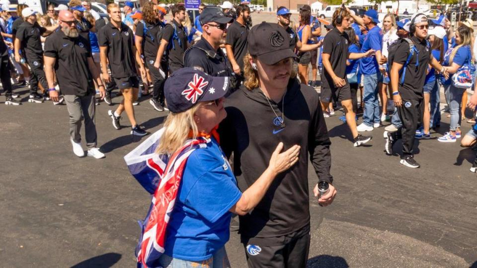 Boise State punter James Ferguson-Reynolds is greeted outside Albertsons Stadium by his mother, Sam Ferguson-Reynolds, as the Broncos enter the stadium for the home opener against UCF, Saturday, Sept. 9, 2023. Sam and her husband John are from Geelong, Australia.