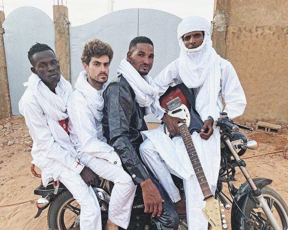 Tuareg guitarist Mdou Moctar, center, and his band will bring their mix of "desert blues" and Western rock to Providence's Columbus Theatre on Feb. 24.
