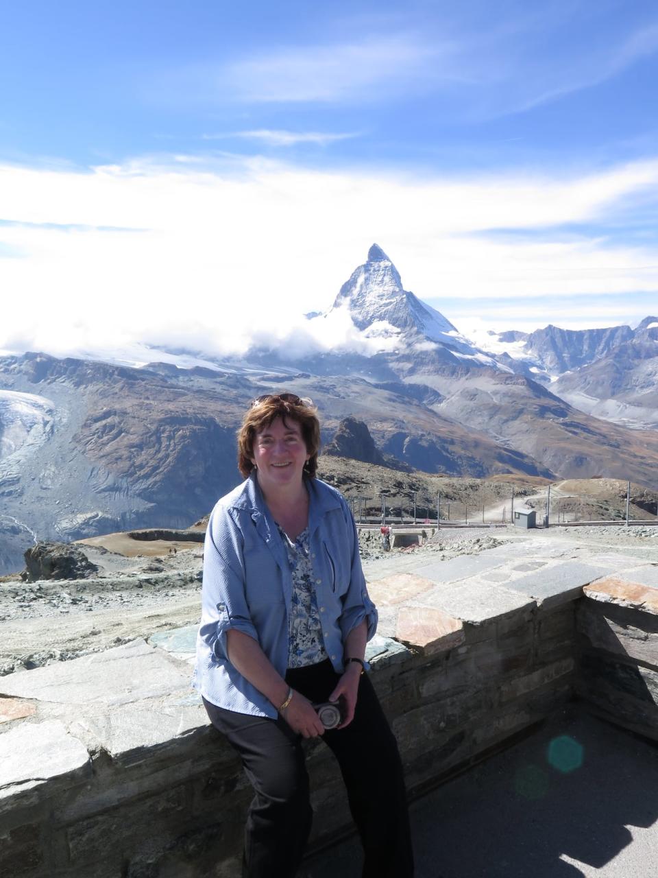 Austin, seen here on top of Gornergrat Mountain in 2015, would take an annual trip to the Swiss Alps. It's a trip that she would train for. During last year's training, her breathlessness was what brought her to the emergency room. 