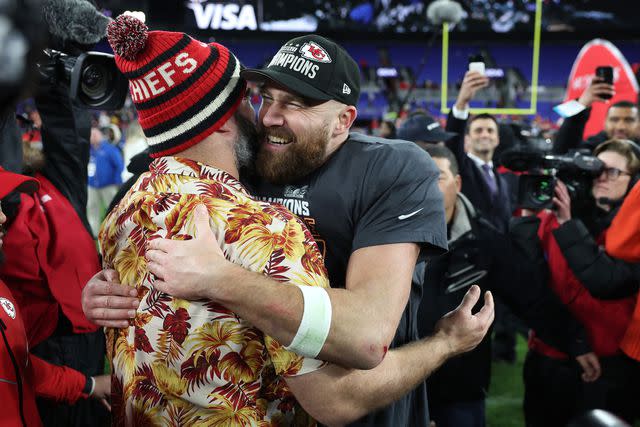 <p> Patrick Smith/Getty</p> Travis Kelce celebrates with his brother Jason Kelce after a 17-10 victory against the Baltimore Ravens in the AFC Championship Game