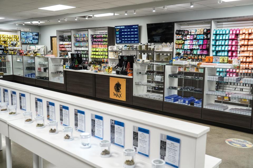 Multiple cannabis products fill the shelves at a cannabis dispensary in Lapeer on Wednesday, November 24, 2021.