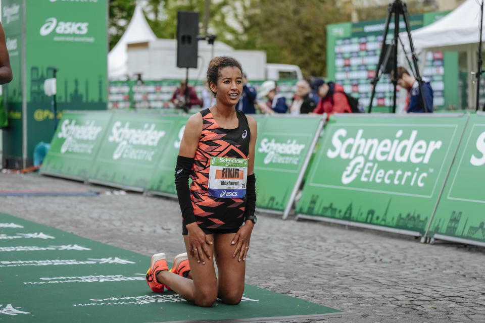 Mestawut Fikir of Ethiopia celebrates winning the women's race of the Paris marathon, in Paris, Sunday, April 7, 2024. (AP Photo/Lewis Joly)