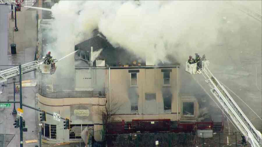 A large fire burning in a home at Colfax and Franklin Street on March 13, 2023