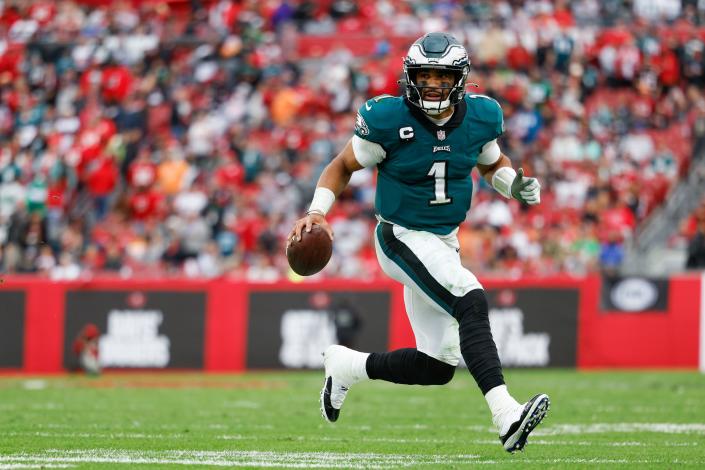 Philadelphia Eagles quarterback Jalen Hurts looks to pass the ball in the second half against the Tampa Bay Buccaneers in a NFC wild-card playoff game.