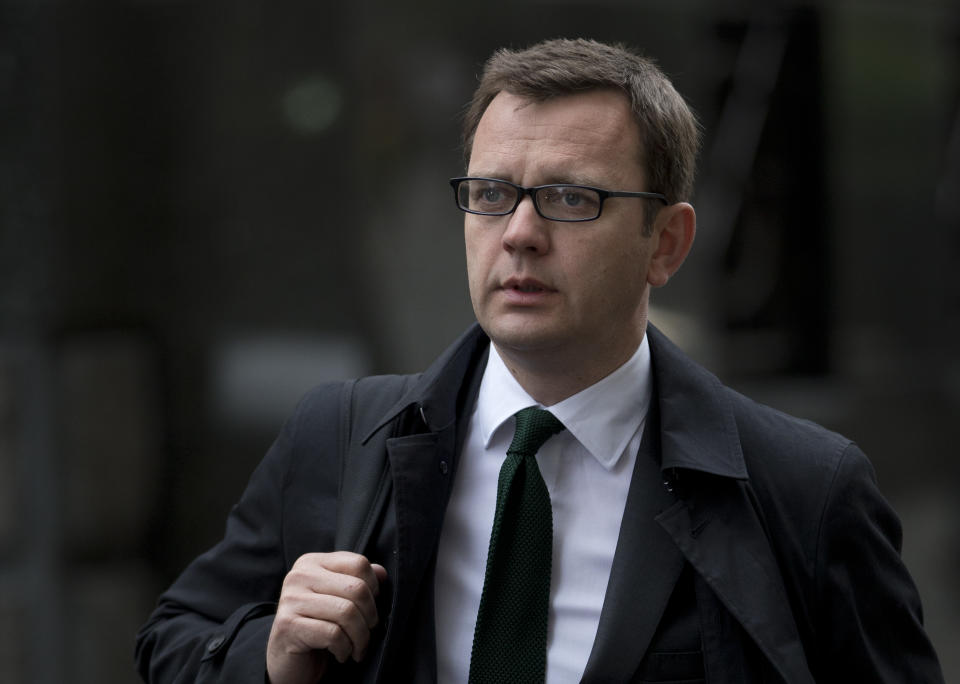 Andy Coulson, former former Editor of the now closed News of the World newspaper arrives at the Central Criminal Court, the Old Bailey, in London where she appears to face charges related to phone hacking Tuesday, April, 22, 2014. (AP Photo/Alastair Grant)