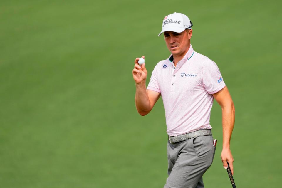 Justin Thomas gestures to the patrons after making his putt on the second green during the first round of The Masters golf tournament at the Augusta National Golf Club in Augusta, Ga., on April 6, 2023. Pga Masters Tournament First Round