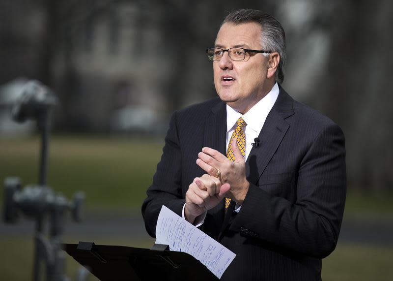 Greg Brown, Chairman and CEO, Motorola Solutions, speaks with the media after meeting with U.S. President Barack Obama and other CEOs at the White House in Washington February 5, 2013. REUTERS/Joshua Roberts