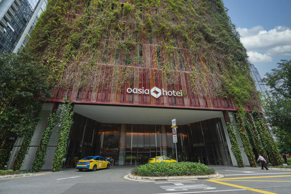 Singapore, January 2020.   The Oasia Hotel Downtown building covered with tropical vegetation designed by Woha Studio, a Singapore-based architectural firm.