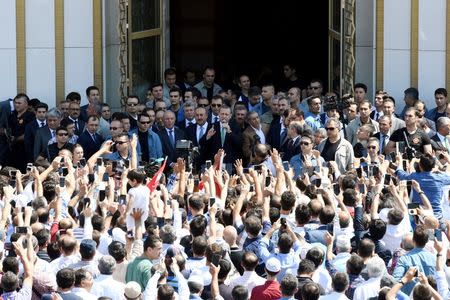 Turkish President Tayyip Erdogan addresses his supporters after the Friday prayers in Ankara, Turkey, July 22, 2016. Kayhan Ozer/Presidential Palace/Handout via REUTERS