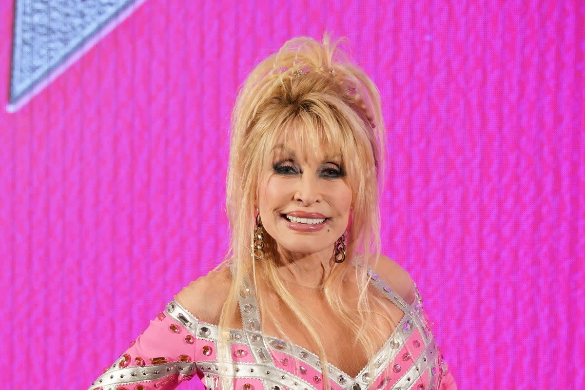 Dolly Parton says she’s ‘almost glad’ abojut being child free  (PA Wire)