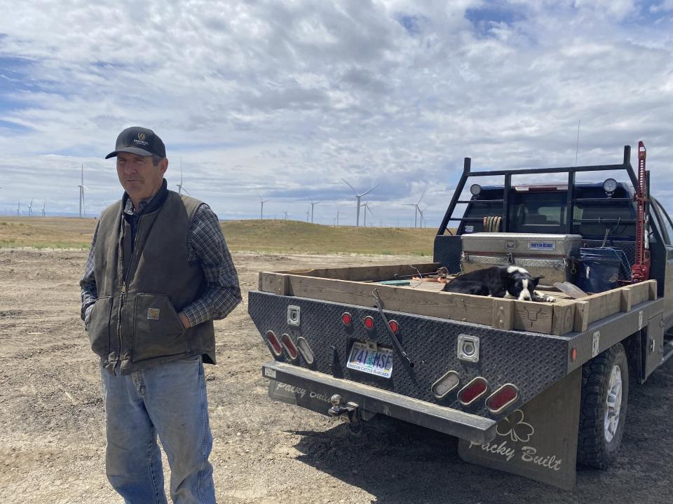 Skye Krebs looks out across his ranch near Arlington, Ore. on Friday, June 17, 2022. Parts of his property were found to have surpassed "economic densities" for Mormon crickets by Oregon Department of Agriculture surveyors. (AP Photo/Claire Rush)