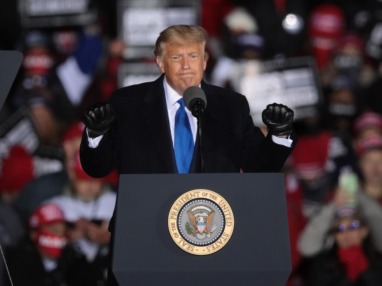 Trump speaks to supporters during a campaign rally at the Waukesha County Airport on Saturday in Waukesha, Wisconsin (Getty)