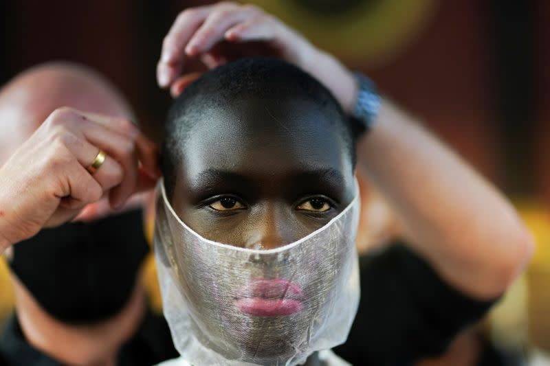 Models prepare backstage of the Bora Aksu catwalk show at London Fashion Week 2020, in London