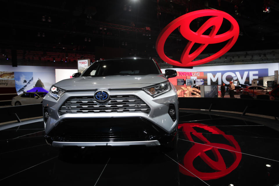 FILE- In this Nov. 28, 2018, file photo the 2019 Toyota RAV4 is displayed at the Los Angeles Auto Show in Los Angeles. Toyota's top U.S. executive says car sales nationwide have bottomed out and his company will keep making them despite a dramatic shift to trucks and SUVs. U.S. CEO Jim Lentz told the Detroit Economic Club Wednesday, Dec. 5, that car sales fell below 30 percent of sales last month, and he thinks that's close to the bottom. (AP Photo/Jae C. Hong, File)