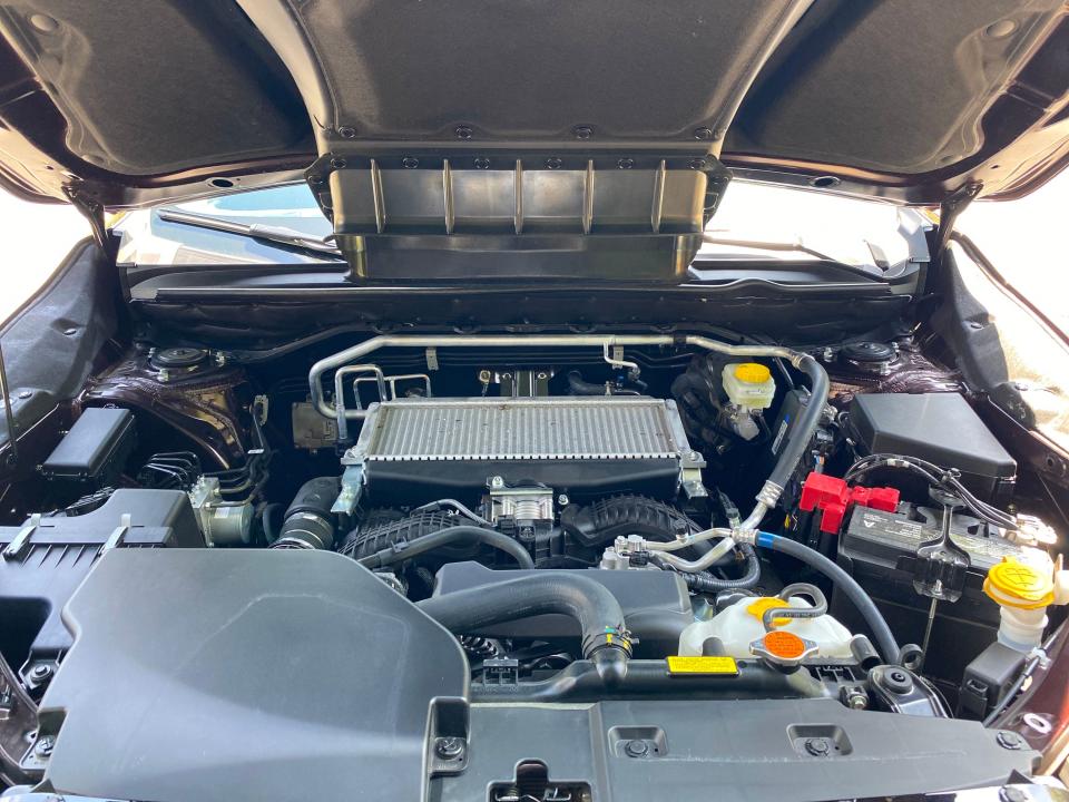 The Subaru Ascent's engine compartment with an intercooler sitting atop a FA24F turbocharged horizontally opposed four-cylinder engine.