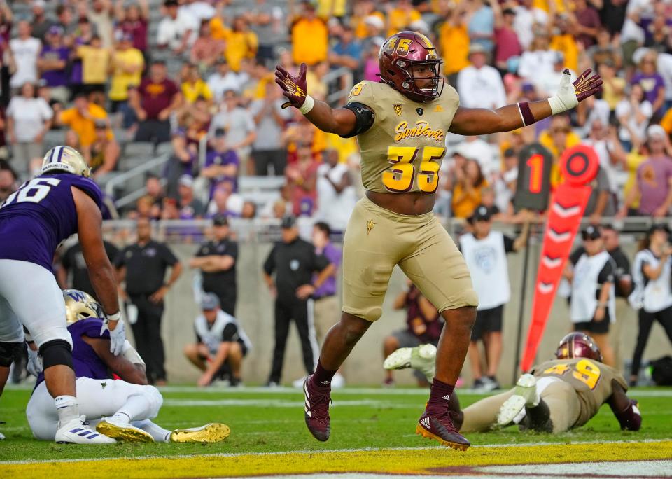 ASU defensive lineman BJ Green II (35) celebrates a sack against Washington near the end zone during a game at Sun Devil Stadium in Tempe on Oct. 8, 2022.