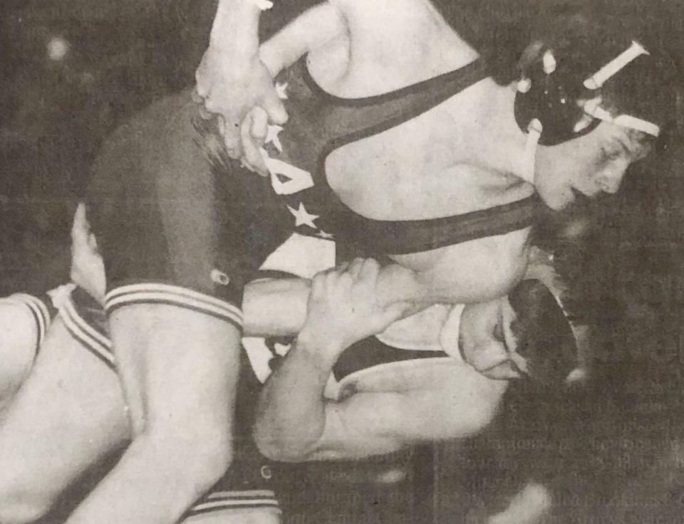 Arlington's Brent Henriksen (top) battles Webster's Lance Opitz for control during their 140-pound championship in the 1994 state Class B high school wrestling tournament at Aberdeen. Henriksen won 7-4.