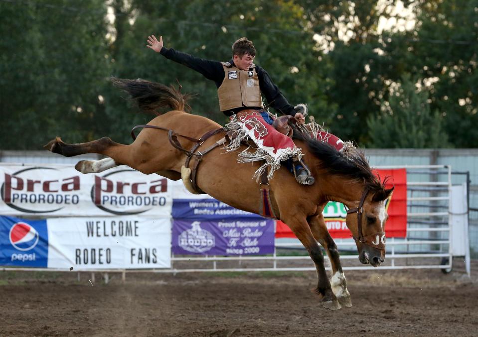 Chance Masters from Leon, Iowa, rides in the Saddle Bronc event during the 76th annual Wild Bill Hickok PRCA Rodeo Bulls, Broncs and Barrels night Wednesday, August 3, 2022, at Eisenhower Park in Abilene.