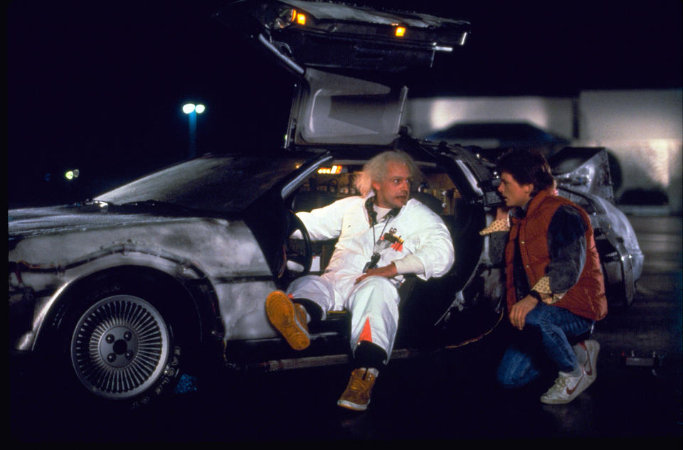 This photo provided by Universal Pictures Home Entertainment shows Christopher Lloyd, left, as Dr. Emmett Brown, and Michael J. Fox as Marty McFly in the 1985 film, “Back to the Future.” (Universal Pictures Home Entertainment via AP)