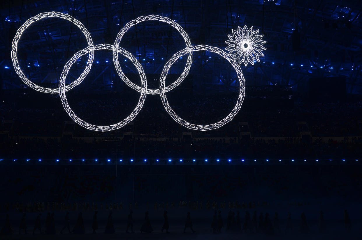 Snowflakes transform into four Olympic rings with one failing to form during the Opening Ceremony of the Sochi 2014 Winter Olympics. (Getty)