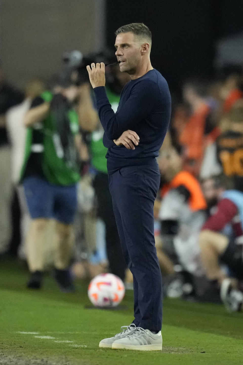 Houston Dynamo head coach Ben Olsen watches from the sideline during the first half of the U.S. Open Cup final soccer match against Inter Miami, Wednesday, Sept. 27, 2023, in Fort Lauderdale, Fla. (AP Photo/Rebecca Blackwell)
