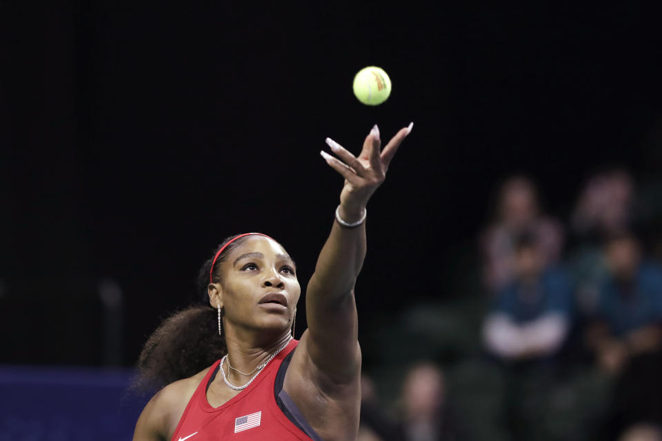 United States' Serena Williams serves against Latvia's Anastasija Sevastova during a Fed Cup qualifying tennis match Saturday, Feb. 8, 2020, in Everett, Wash. (AP Photo/Elaine Thompson)