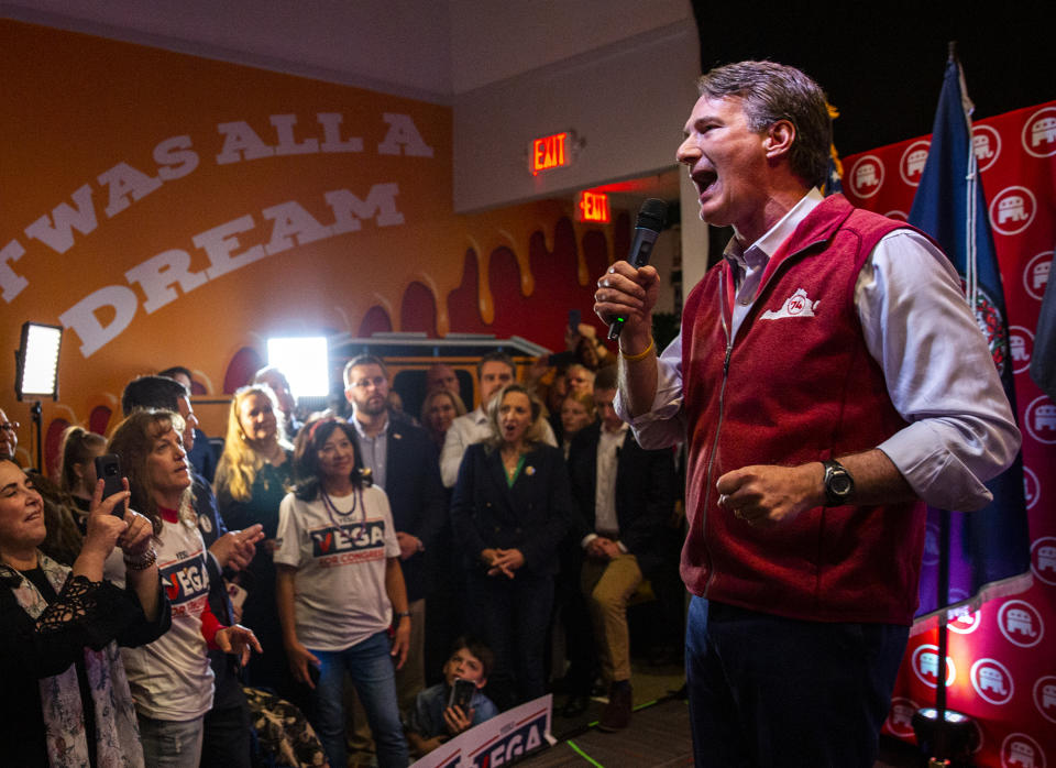 Virginia Gov. Glenn Youngkin hypes up the crowd during a rally for Yesli Vega at Gourmeltz in Spotsylvania County, Va., Monday, Oct. 17, 2022. (Tristan Lorei/The Free Lance-Star via AP)