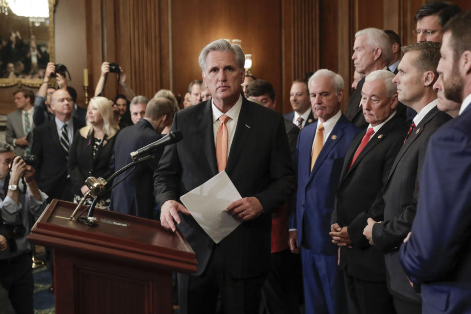 House Minority Leader Kevin McCarthy of Calif., center, is joined by fellow Republican lawmakers as he walks up to the podium to begin speaking during a news conference on Capitol Hill in Washington, Thursday, Oct. 31, 2019. Democrats pushed a package of ground rules for their inquiry of President Donald Trump through a sharply divided House, the chamber's first formal vote in a fight that could stretch into 2020 election. (AP Photo/Pablo Martinez Monsivais)