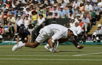 Serbia's Novak Djokovic on the floor in his Men's Final against Great Britain's Andy Murray during day thirteen of the Wimbledon Championships at The All England Lawn Tennis and Croquet Club, Wimbledon.