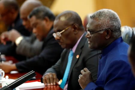 Solomon Islands Prime Minister Manasseh Sogavare attends a meeting with Chinese Premier Li Keqiang at the Great Hall of the People in Beijing