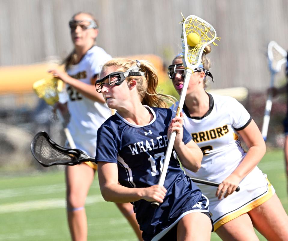 Bailey Lower of Nantucket prepares to shoot followed by Shannon Brown of Nauset.