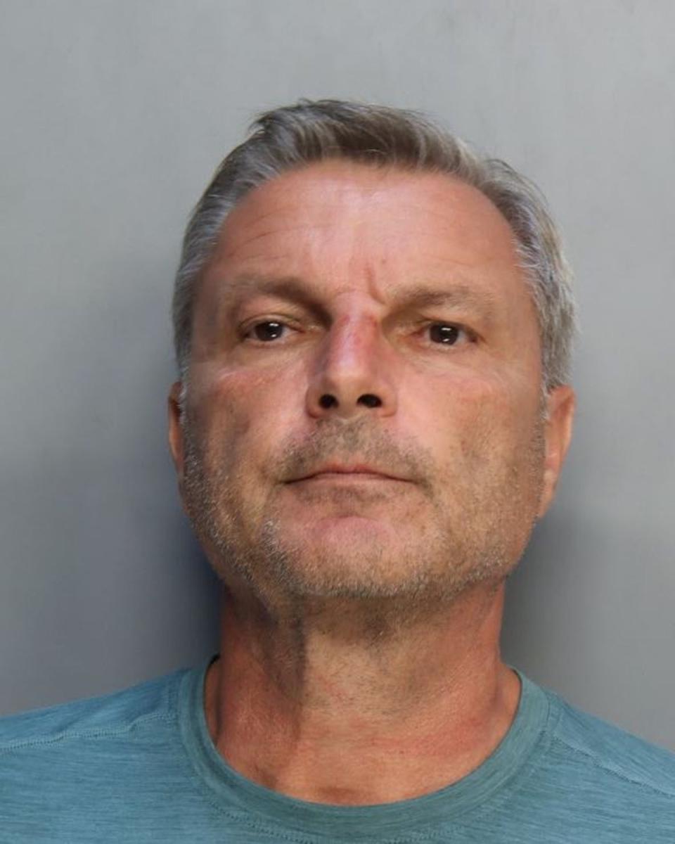 Robert Marcu, 60, has been arrested on felony charges of aggravated child abuse and battery by strangulation after he choked a 10-year-old boy who had been playing with his son (Miami-Dade Corrections & Rehabilitation)