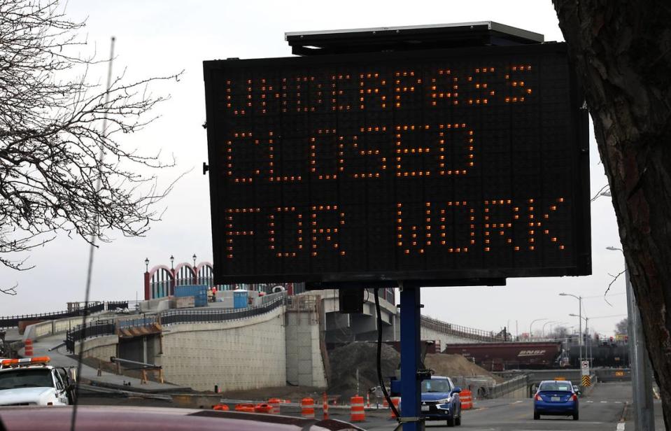 An electronic message board warns drivers of the pending closure of the Lewis Street underpass. Traffic will be rerouted until the new overpass opens. Bob Brawdy/bbrawdy@tricityherald.com