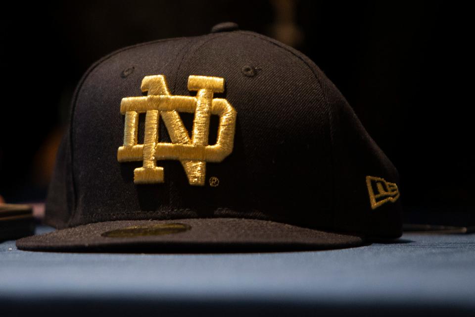 Notre Dame's bowl future was decided by drawing bowl names from a hat on Sunday. The Notre Dame hat in the image was used in a signing day commitment announcement in 2021.