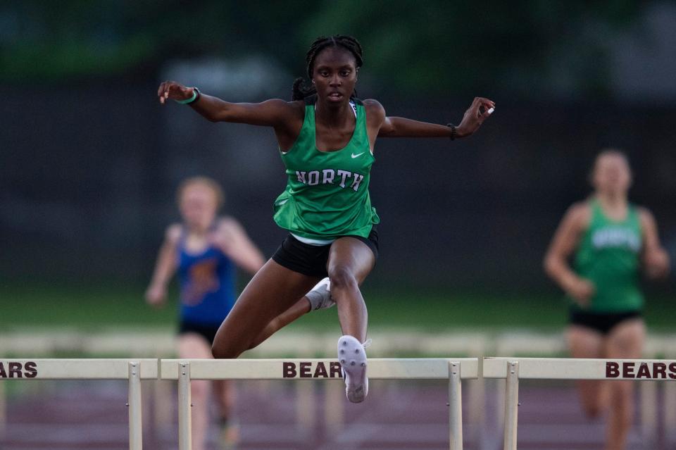 North’s Alishia Darrett leads in the 300 meter hurdles during the 2023 IHSAA Girls Track and Field Sectional 32 at Central High School in Evansville, Ind., Tuesday evening, May 16, 2023.