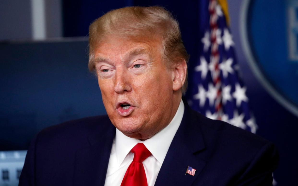 President Trump said the measure will be temporary - Alex Brandon/AP