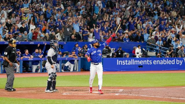 Toronto Blue Jays fans get in the spirit before the first inning of game 1  of the American League Championship Series at Progressive Field in  Cleveland, Ohio on October 14, 2016. Photo