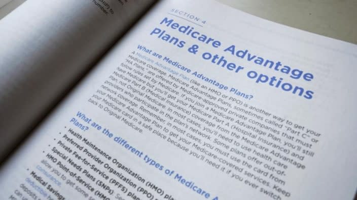 This Nov. 8, 2018 file photo shows a page from the 2019 U.S. Medicare Handbook in Washington. Health insurers will flood the Medicare Advantage market again this fall with enticing offers of plans that have no monthly price tag. (Photo: Pablo Martinez Monsivais/AP, File)