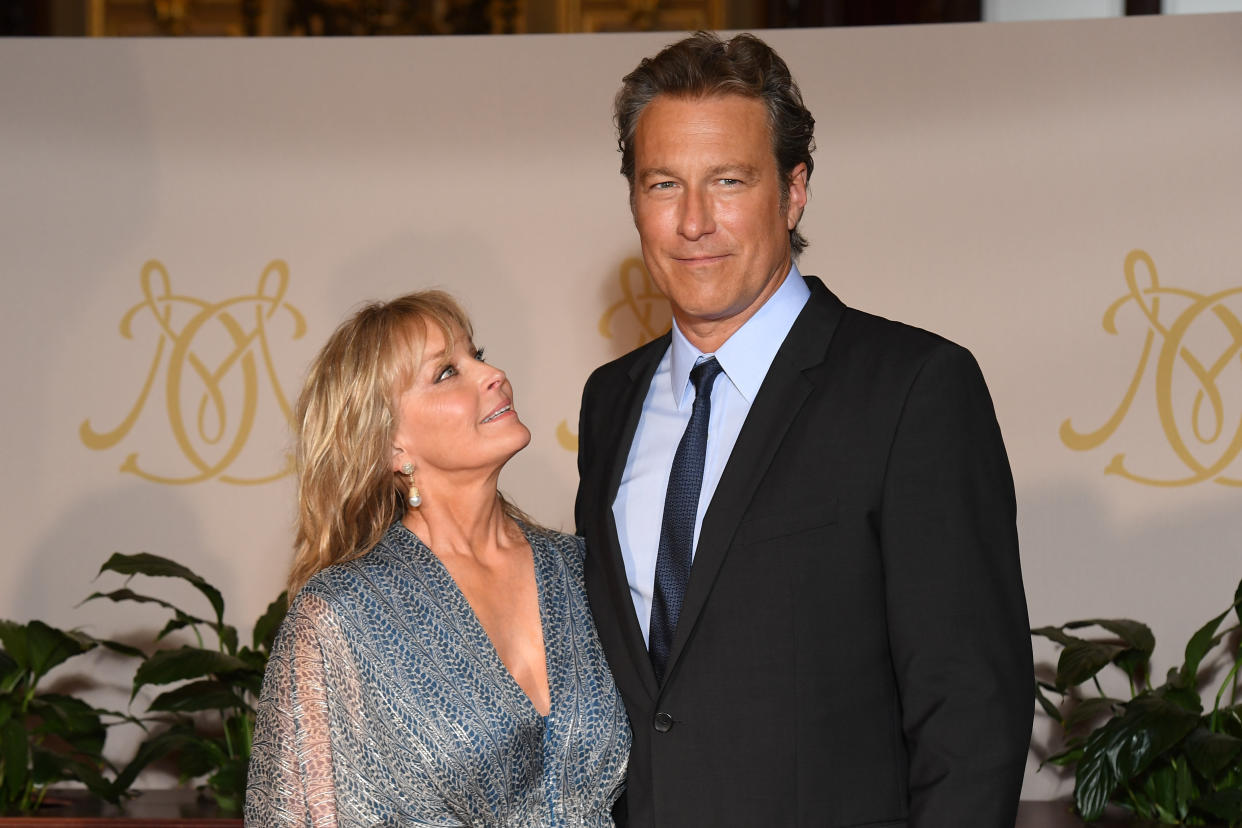 Bo Derek and John Corbett have been dating for 18 years. "We take things day by day," Derek said of the duo's relationship status. (Photo: Stephane Cardinale - Corbis via Getty Images)