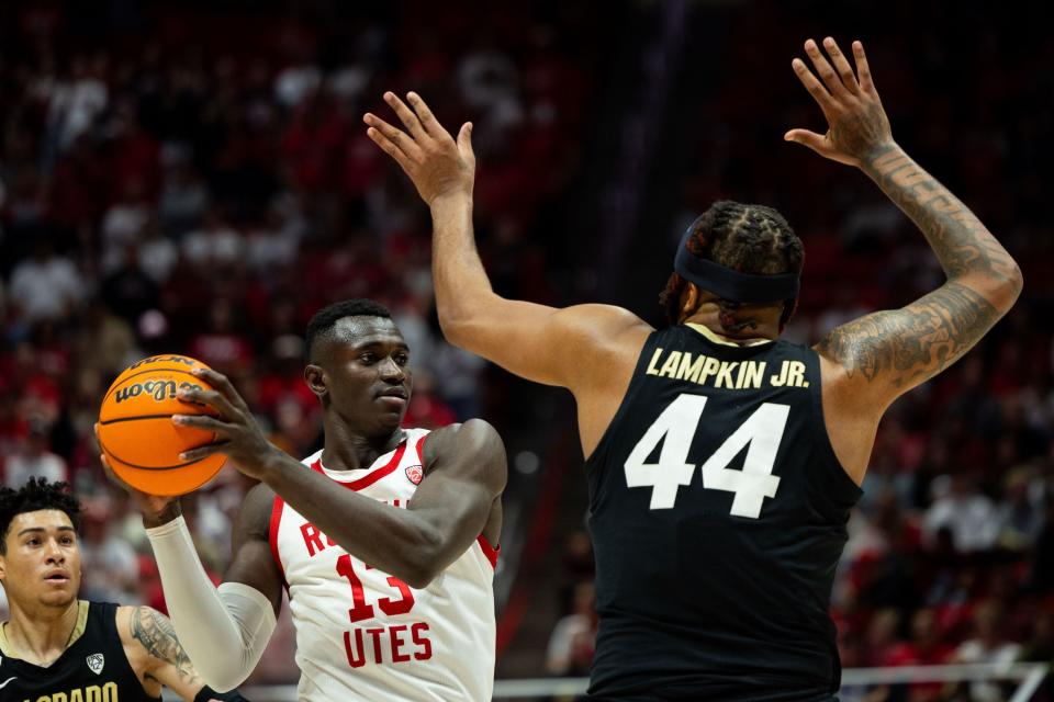 Utah Utes center Keba Keita (13) holds the ball with Colorado Buffaloes center Eddie Lampkin Jr. (44) on defense during the men’s college basketball game between the Utah Utes and the Colorado Buffaloes at the Jon M. Huntsman Center in Salt Lake City on Saturday, Feb. 3, 2024. | Megan Nielsen, Deseret News