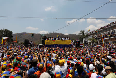 Venezuelan opposition leader Juan Guaido, who many nations have recognised as the country's rightful interim ruler, takes part in a rally against Venezuelan President Nicolas Maduro's government, in Valencia, Venezuela March 16, 2019. REUTERS/Carlos Jasso