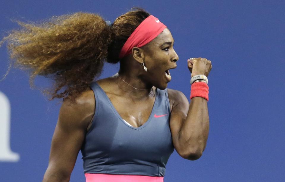 Serena Williams, of the United States, pumps her fist after winning a point against Francesca Schiavone, of Italy, during the first round of the 2013 U.S. Open tennis tournament, Monday, Aug. 26, 2013, in New York. (AP Photo/Charles Krupa)