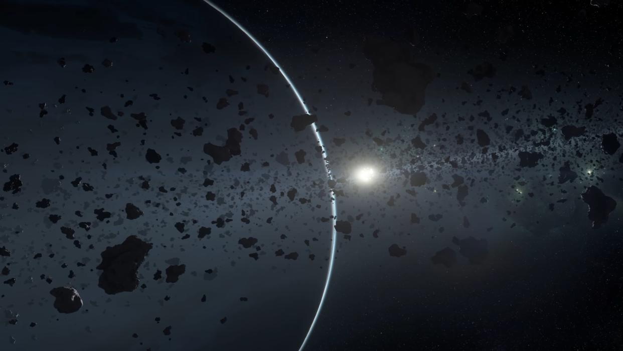  A ringed planet silhoutted against a star in Star Citizen. 
