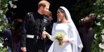 <p>Harry exits St. George's chapel with his new wife, Meghan, after their wedding. <br></p>