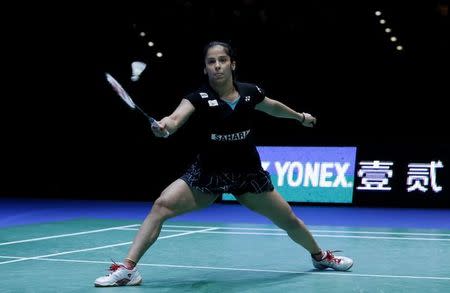 Saina Nehwal in action during Yonex All England Open Badminton Championships 2015 women's singles final at the National Indoor Arena, Birmingham March 8, 2015. REUTERS/ Peter Cziborra