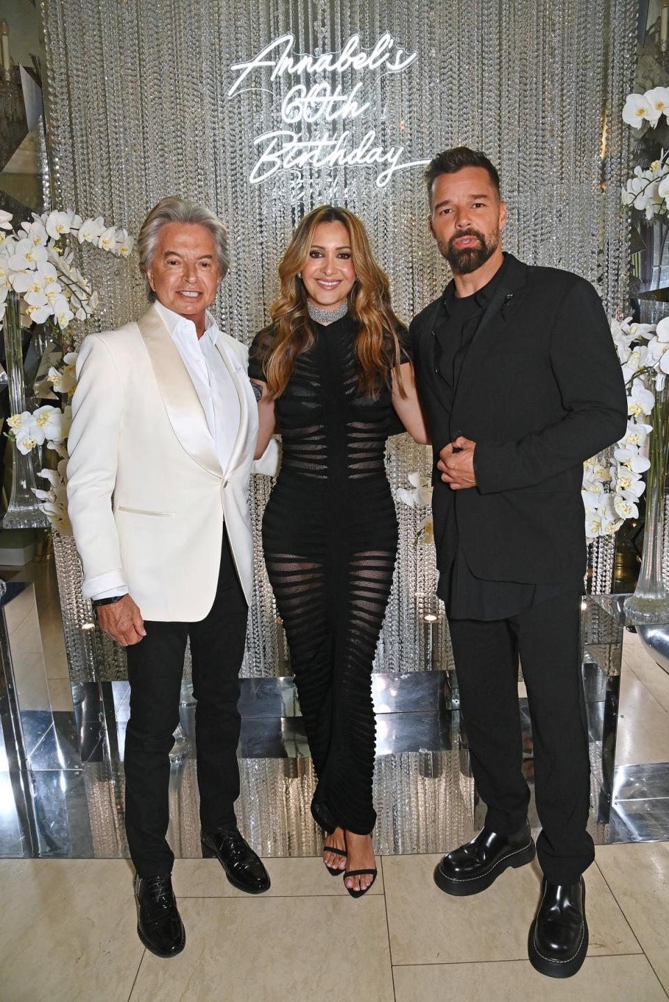 Richard and Patricia Caring with Ricky Martin (Dave Benett)