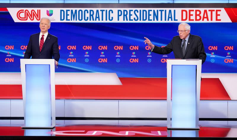 Democratic U.S. presidential candidates Senator Bernie Sanders and former Vice President Joe Biden at the 11th Democratic candidates debate of the 2020 U.S. presidential campaign in Washington