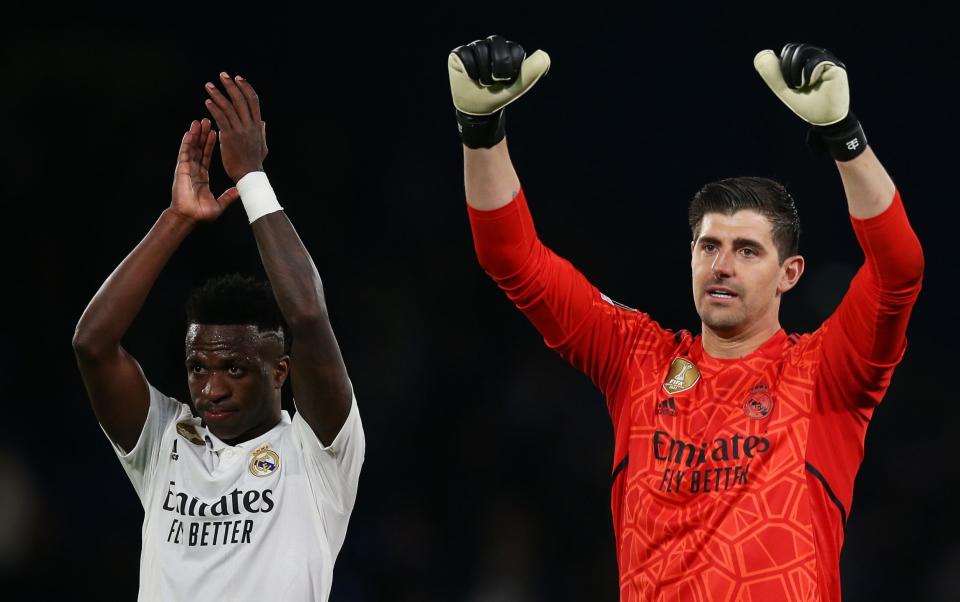 Thibaut Courtois celebrates victory with Vinicius Junior at the place he once called 'home' - Steve Bardens/Uefa via Getty Images