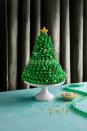 <p>Nine layers of breath-taking beauty! This Christmas tree cake is perfect for when you <em>really</em> want to show off this holiday season. We recommend using a homemade cake recipe, like our <a href="https://www.delish.com/cooking/a27750610/homemade-chocolate-cake-recipe/" rel="nofollow noopener" target="_blank" data-ylk="slk:chocolate;elm:context_link;itc:0;sec:content-canvas" class="link ">chocolate</a> or <a href="https://www.delish.com/cooking/recipe-ideas/a27044802/yellow-cake-recipe/" rel="nofollow noopener" target="_blank" data-ylk="slk:yellow cakes;elm:context_link;itc:0;sec:content-canvas" class="link ">yellow cakes</a>, but boxed cake mix will work too.</p><p>Get the <strong><a href="https://www.delish.com/holiday-recipes/christmas/a37692825/christmas-tree-cake-recipe/" rel="nofollow noopener" target="_blank" data-ylk="slk:Christmas Tree Cake recipe;elm:context_link;itc:0;sec:content-canvas" class="link ">Christmas Tree Cake recipe</a></strong>.</p>