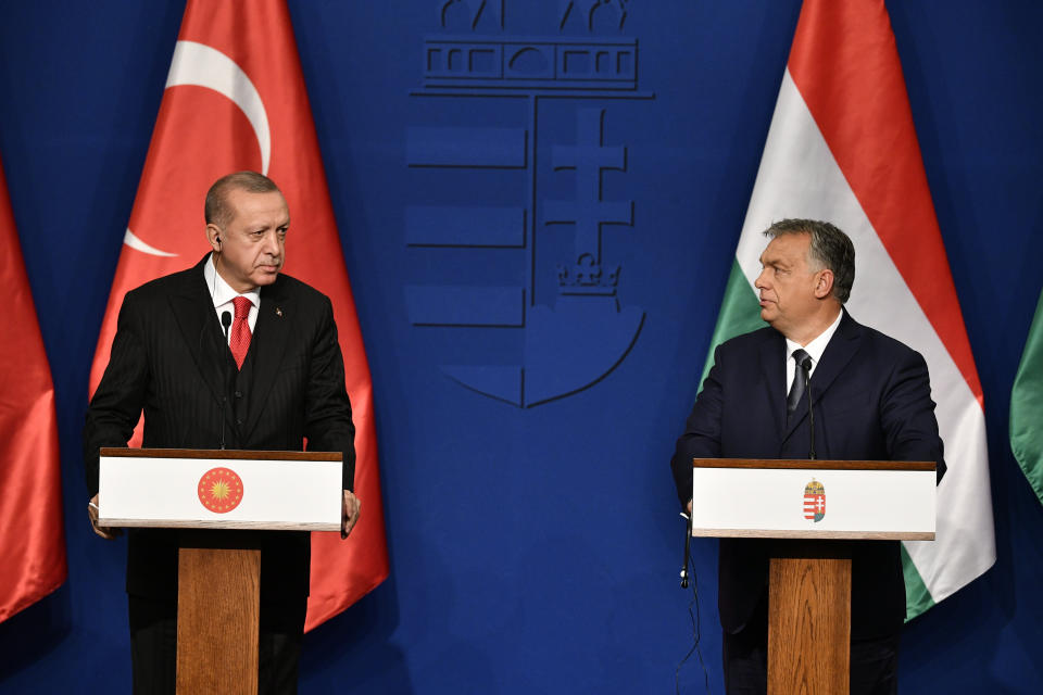 Turkish President Recep Tayyip Erdogan, left, and Hungarian Prime Minister Viktor Orban hold a joint press conference after their meeting in Budapest, Hungary, Thursday, Nov. 7, 2019. (Zsolt Szigetvary/MTI via AP)